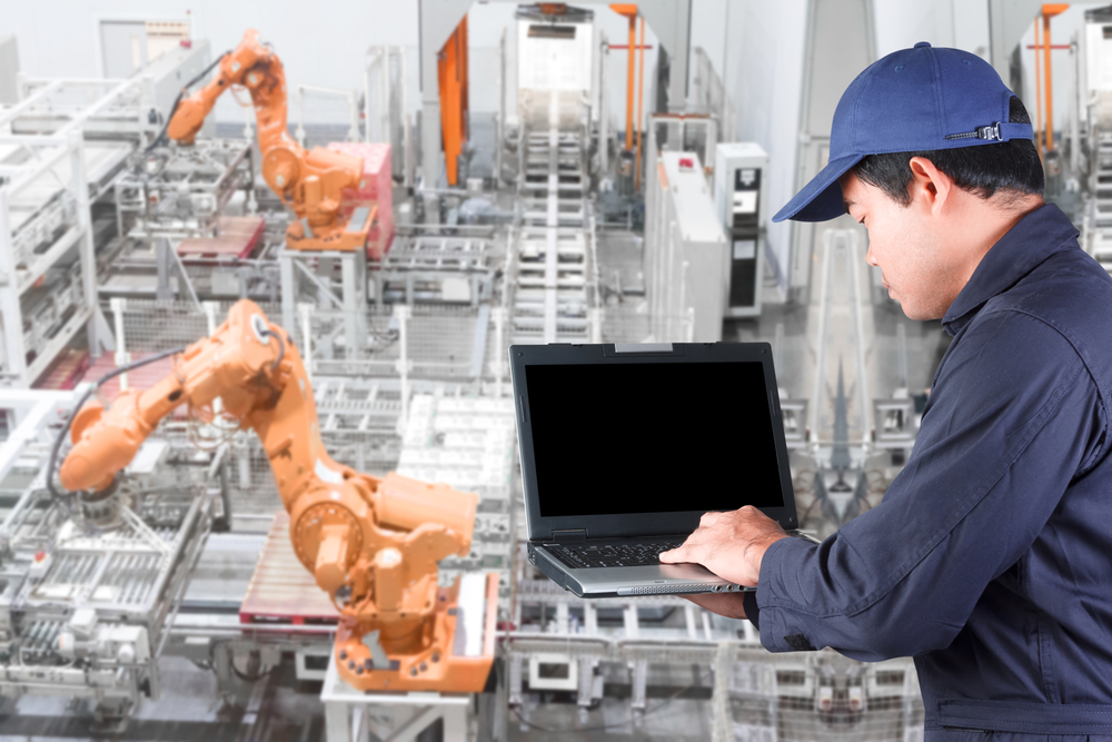 Engineer programing computer